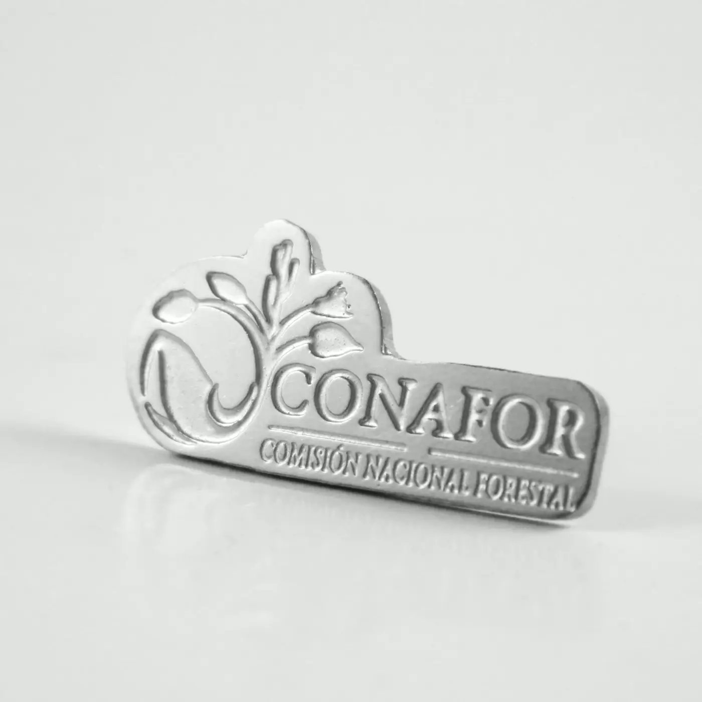 Pines metálicos personalizados para CONAFOR